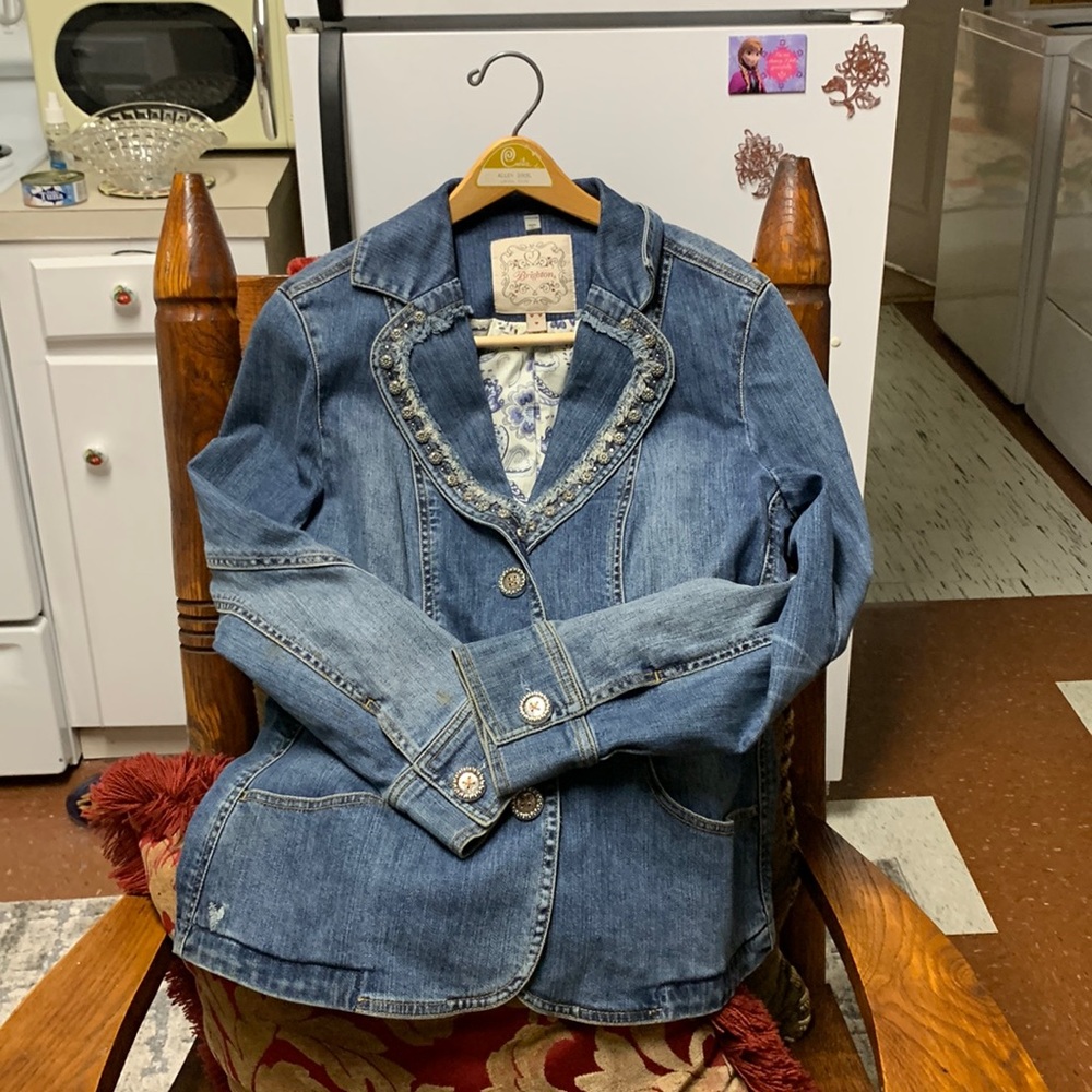 The jacket is a Brighton. It is a beautiful one. It has been taken care of.